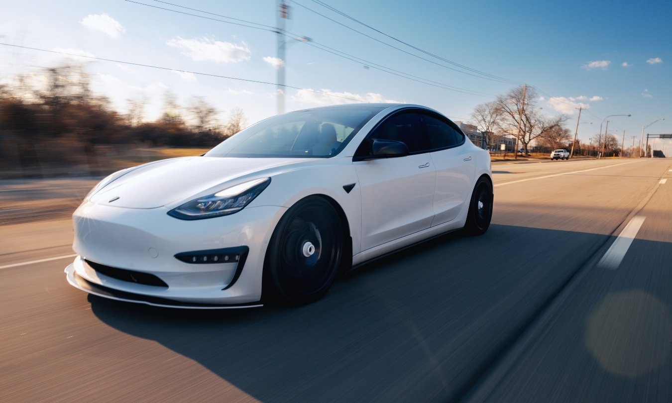 White Tesla on the road