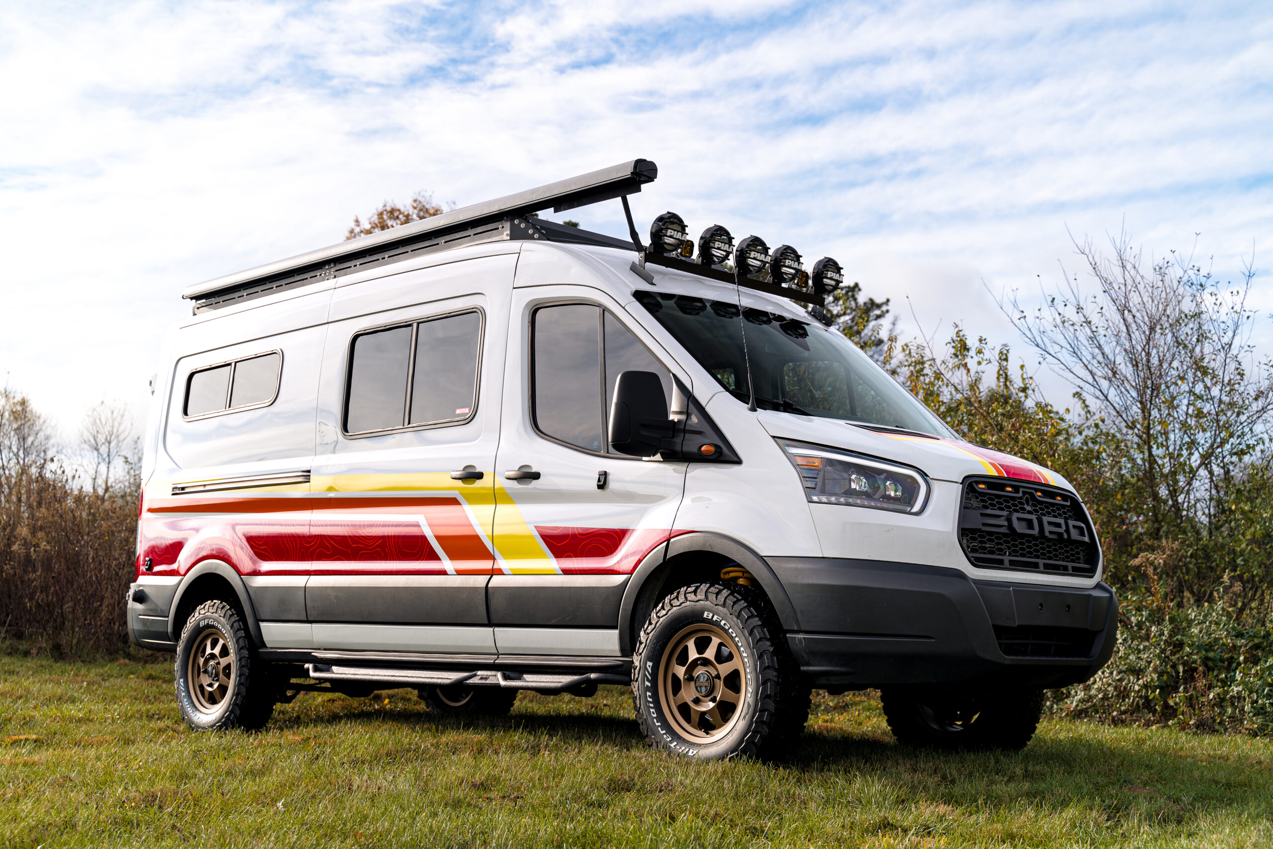 Ford Transit Van with lift, graphics, wheels, transformation